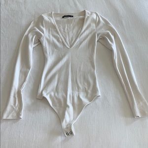 cream deep V bodysuit